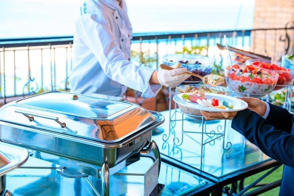 Fleet Club Mahrousa Alexandria Bagian luar foto A buffet at a hotel